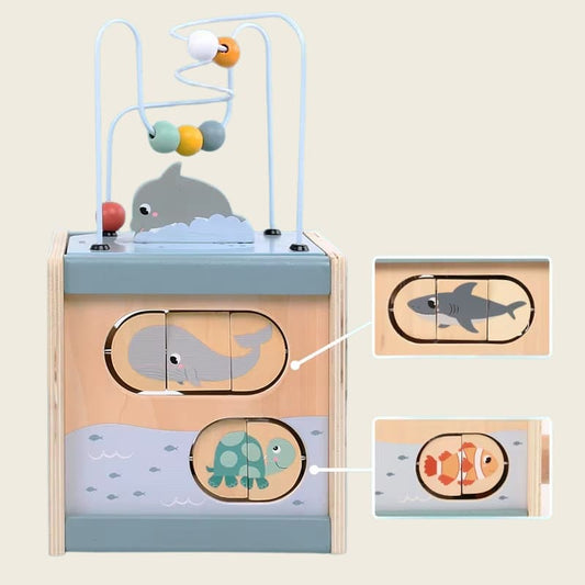 Cube d'activité Montessori en bois, avec jeux interactifs pour développer la motricité fine des enfants.