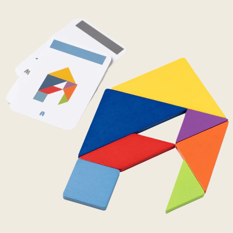 Jeu éducatif Tangram Montessori en bois naturel, idéal pour stimuler la créativité
